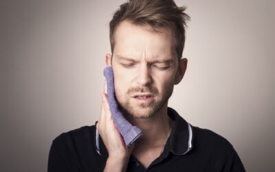 Why Does My Tooth Hurt When I Bite Down? Causes & Fixes